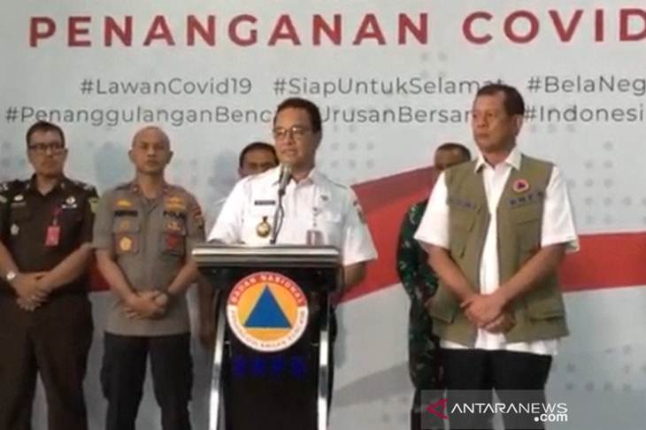Tangkapan layar siaran langsung konferensi pers Kepala BNPB Doni Munardo dan Gubernur DKI Jakarta Anies Baswedan di Kantor BNPB, Rabu (18/3/2020). (ANTARA/Livia Kristianti)