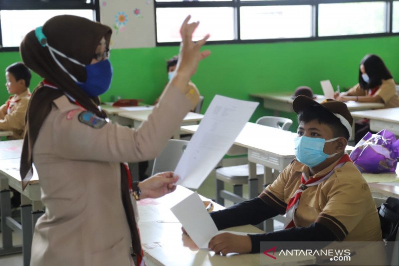 Uji coba sekolah tatap muka. (Foto: Antara)