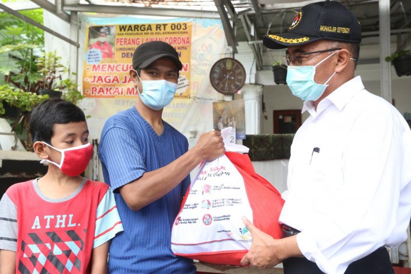 Data Penerima Bansos Kacau, Anak Buah Jokowi Minta Bantuan ke RT/RW
