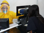 Layani Perekaman e-KTP, Pegawai Disdukcapil Sleman Kenakan APD