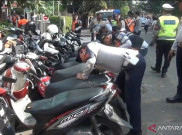 Operasi Cabut Pentil di Daan Mogot: 150 Motor Terjaring, 3 Tukang Parkir Liar Dibina