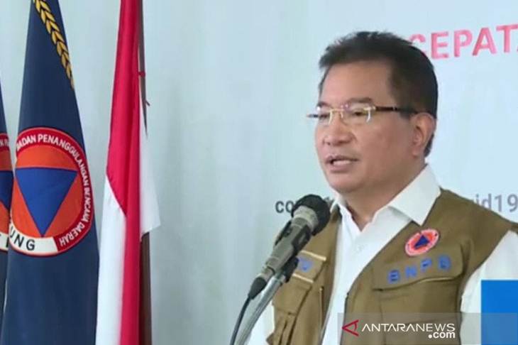 Tangkapan layar Ketua Tim Pakar Gugus Tugas Penanganan Percepatan COVID-19 Wiku Adisasmito dalam konferensi pers di BNPB, Minggu (5/4/2020). (ANTARA/Livia Kristianti)