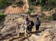 Semangat Polisi Terobos Kampung Terisolasi di Aceh Dengan Pakai Trail