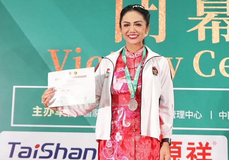 Kris Dayanti Raih Medali Perak di Kejuaraan Dunia Wushu 2025 di China