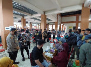 Solo PPKM Level 3, Polresta Surakarta Vaksin Booster Ratusan Pedagang Pasar Klewer