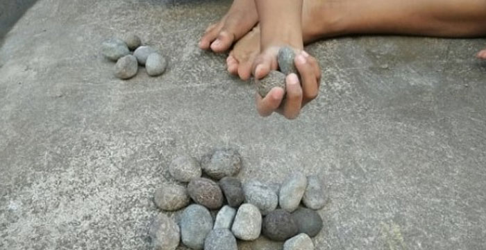 Menjajal Permainan Tangkap Batu Marsiada Khas Toba dengan 5 Level Tantangan