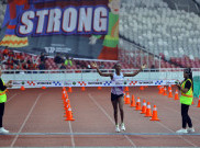 Aksi Para Pelari dalam Ajang BTN Jakarta International Marathon 2025