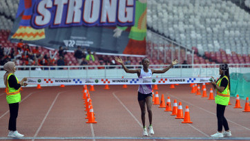 Aksi Para Pelari dalam Ajang BTN Jakarta International Marathon 2025
