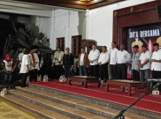  Ratusan Petugas KPPS Gugur, Warga Solo Adakan Doa Bersama dan Nyalakan Lilin di Gedung Keluarga Jokowi