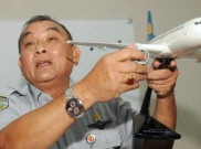Cuaca Ekstrem Hambat Pencarian Pesawat AirAsia