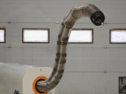 Tesla akan Membuat Robot Ular untuk Mobilnya