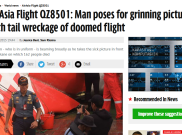 Foto Perwira TNI di Ekor Pesawat QZ8501 Hebohkan Media Luar