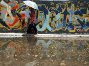 Seniman 'Streeat Art' Memperindah Tembok Kota Tua dengan Grafiti