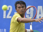 Aksi Petenis Aditya Hari Sasongko di Kejuaraan Tenis PGN