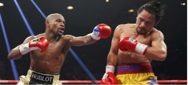 Floyd Mayweather Jr Tumbangkan Manny Pacquiao di MGM Grand Arena