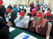 Heboh, Calon Anggota MLM Diwajibkan Cium Uang