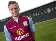 Perhatian Wayne Rooney pada Tom Cleverley