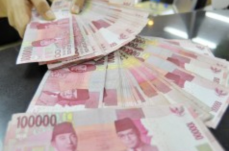 Rupiah Dibuka Menguat ke Rp13.450 per Dollar AS