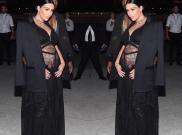 Kim Kardashian Tampil Seksi dengan Gaun Transparan dan Perut Buncit