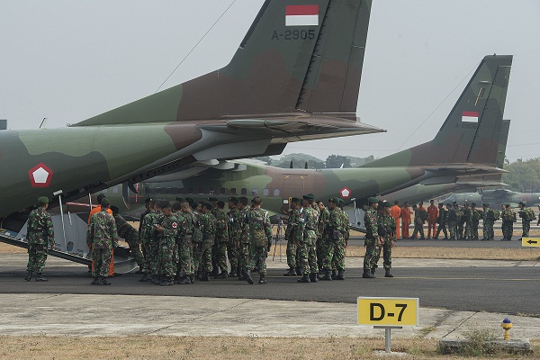 Dari Qatar, Jokowi Perintahkan Panglima TNI - Kapolri Tambah Pasukan