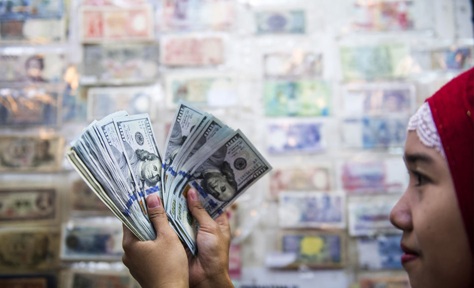 Rupiah Tembus Rp13.800 per Dollar AS