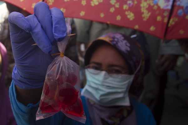 Polisi Gelandang 4 Orang Pengusaha Tahu Berformalin