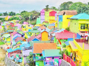 Liburan Penuh Warna Enzy Storia di Kampung Jodipan Malang