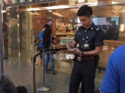 Senyum Lee Minwei Membuat Pelancong Betah di Changi