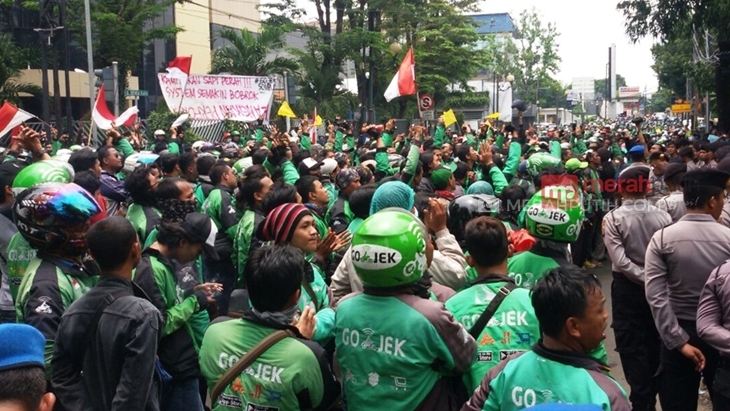 Para mitra pengemudi Gojek menggelar aksi beberapa waktu lalu (MP/Noer Ardiansjah)