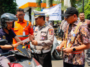 Terobos Perlintasan Kereta Api, Pengendara Bisa Ditilang Polisi