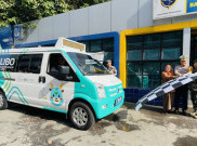Polisi Awasi Uji Coba Angkot Listrik di Bogor