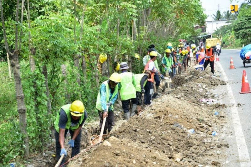 Padat karya. (Foto: Antara)