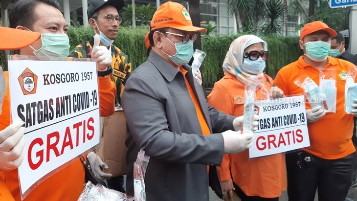 Puluhan Ribu Masker Dibagikan di Bundaran HI Cegah Penyebaran Corona