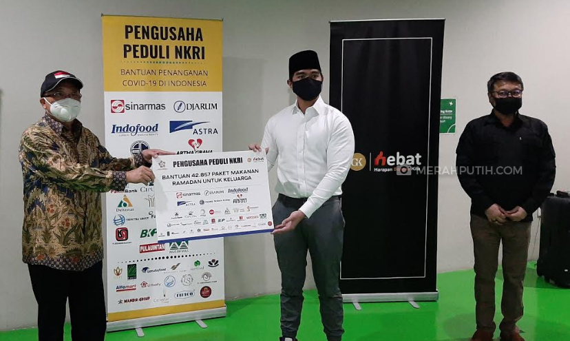 JIC dan Pengusaha Peduli NKRI Berikan 42 Ribu Paket Sembako ke Pengemudi Ojol