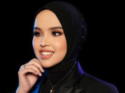 Putri Ariani Beri Semangat Membara Lewat Fokus Trek 'Crown'