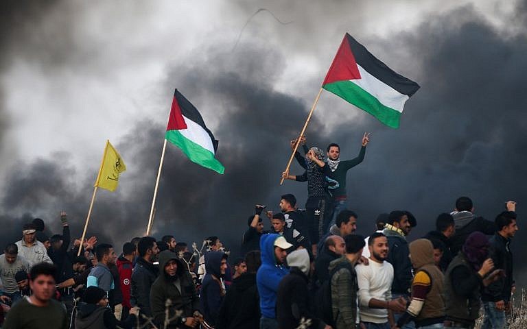 Warga Palestina demo di Gaza. Foto: AFP Photo/Mohammed Abed