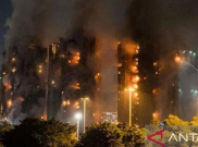 Kebakaran Hong Kong Tewaskan 128 Orang, Petugas Pemadam Lakukan Pencarian Terakhir