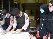 Pelajar Kakak Beradik Sumbangkan Uang Tabungan Selama Setahun untuk Penanganan COVID-19