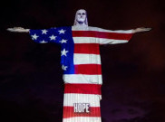 ‘Patung Kristus Sang Penebus Janeiro di Rio de Janeiro Diterangi Dengan Potret-potret Pekerja Kesehatan