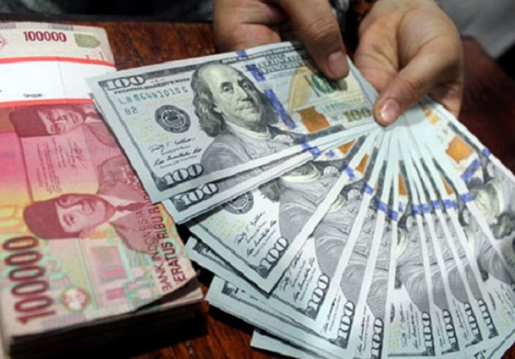 Analis Pasar Saham Prediksi Rupiah Bisa Bergerak ke Rp14.900 per Dolar AS