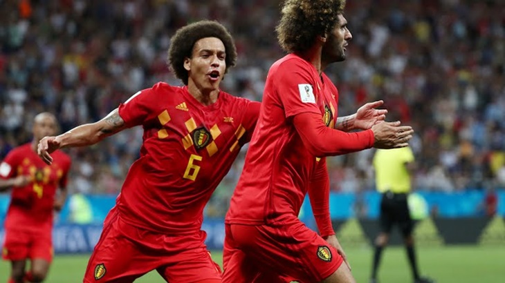 Pemain Belgia merayakan gol