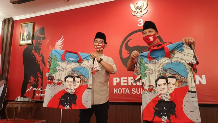 Gibran-Teguh Tebar Pesona, Kenakan Baju Seragam Politik Bergambar Naik Banteng