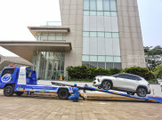 Dukung Keamanan Mobil Listrik, Asuransi Astra Hadirkan Layanan Towing Hydraulic Flatbed
