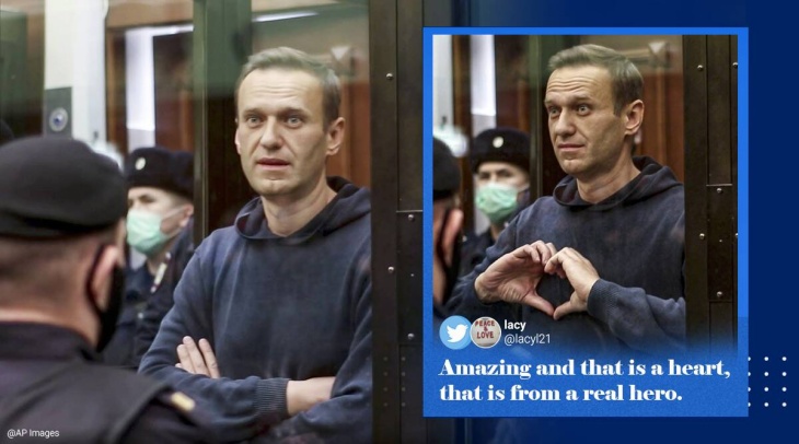 Navalny memberikan simbol hati untuk Yulia. (Foto The India Express)