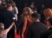 Taylor Swift Terima Bunga dari Penggemar Cilik di Karpet Merah Grammy 2025, Dibalas dengan Tos