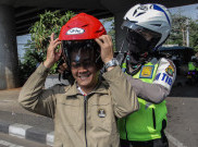 Polda Metro Akan Berdayakan Pak Ogah Atur Lalu Lintas 