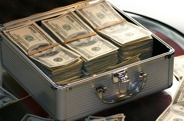 Sebelum Traveling Ke Luar Negeri, Yuk Intip Tips Cerdas Dalam Menukar Uang 