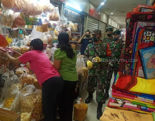 Marinir Hingga Paskhas Diperbantukan Tegakkan Protokol Kesehatan di Kawasan Padat Penduduk dan Pasar