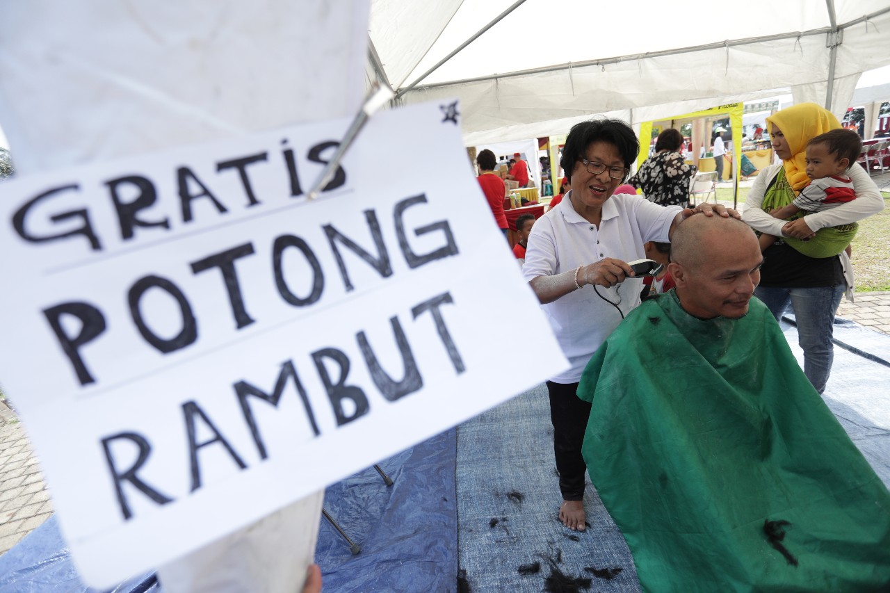 Anak-Anak Waduk Pluit Jejali Arena Permainan dan Gunting Rambut Gratis Pesta Rakyat Cap Go Meh 2018