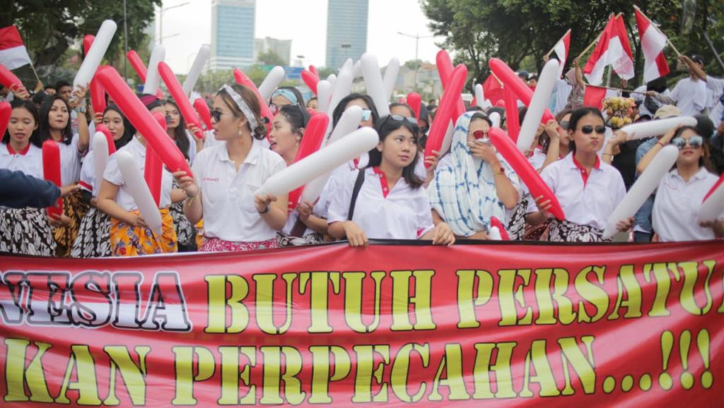 Sekelompok massa yang mengatasnamakan diri Masyarakat Penegak Demokrasi (MPD) dan Srikandi Milenials menggelar aksi demonstrasi di depan Gedung Merah Putih KPK, Kuningan, Jakarta Selatan, Jumat (27/9) kemarin. Foto: MP/Ponco